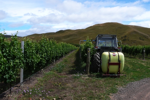 image of a tractor doing vineyard maintenance in Marlborough